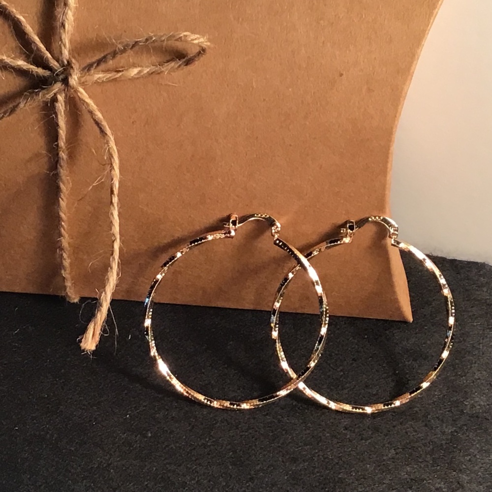 Hoop Earrings - Gold Tone - Diamond Cut Brings Added Sparkle